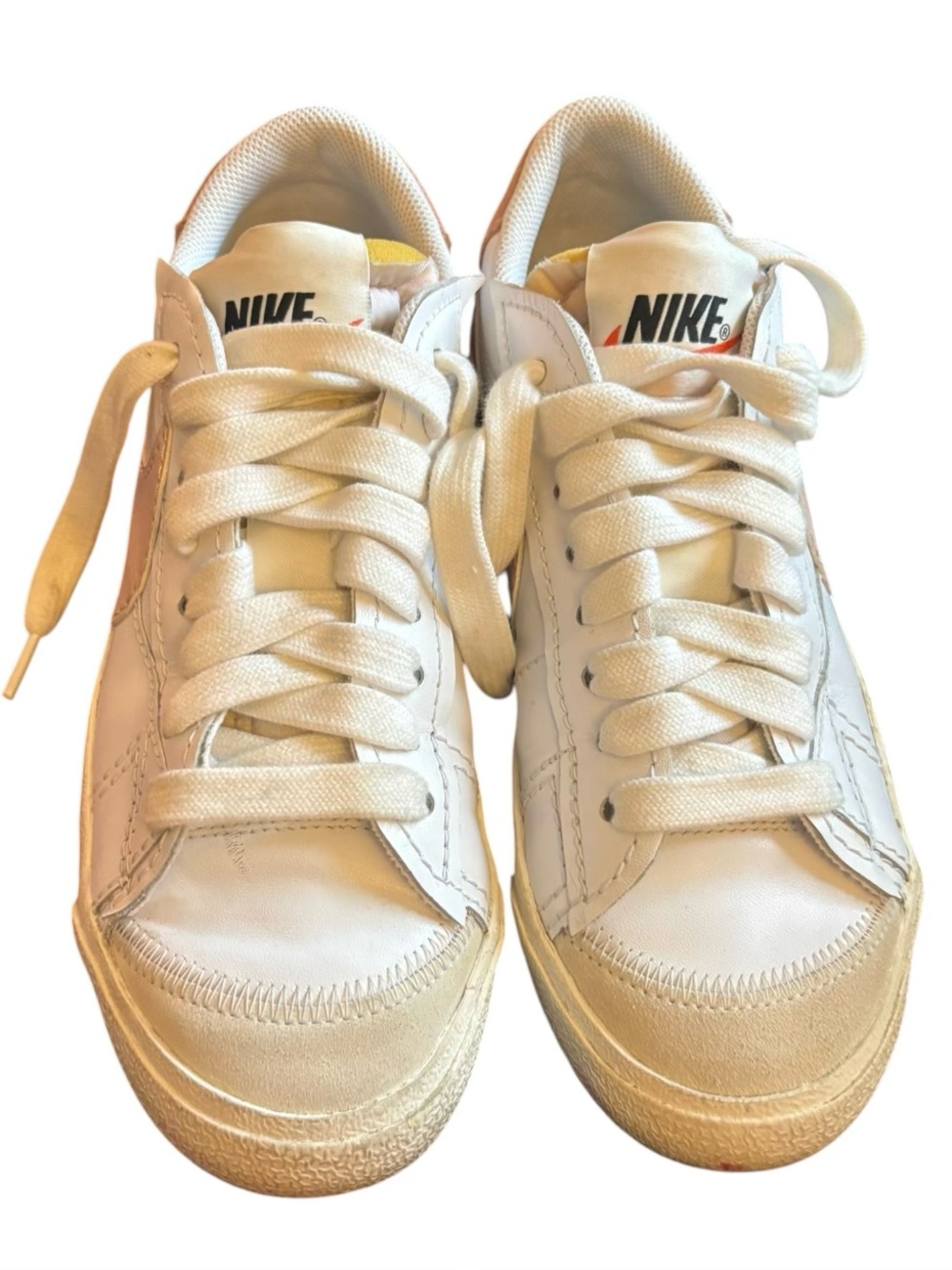 Nike White Low-Top Sneakers with Black Swoosh
